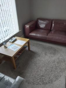 Room 2 at The Ellesmere Centre Beverley Road with a sofa and two chairs