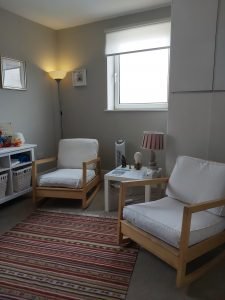 Shot of Room 5 at The Ellesmere Centre Holderness Road showing comfy chairs and the decorative touches such as lamps and a rug
